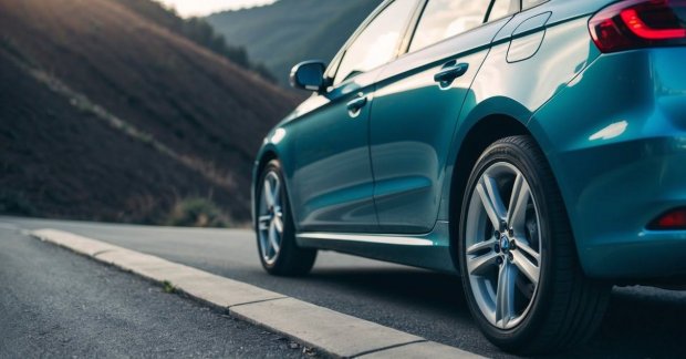 Does Parking on a Hill Damage Your Car? Understanding the Risks and Precautions