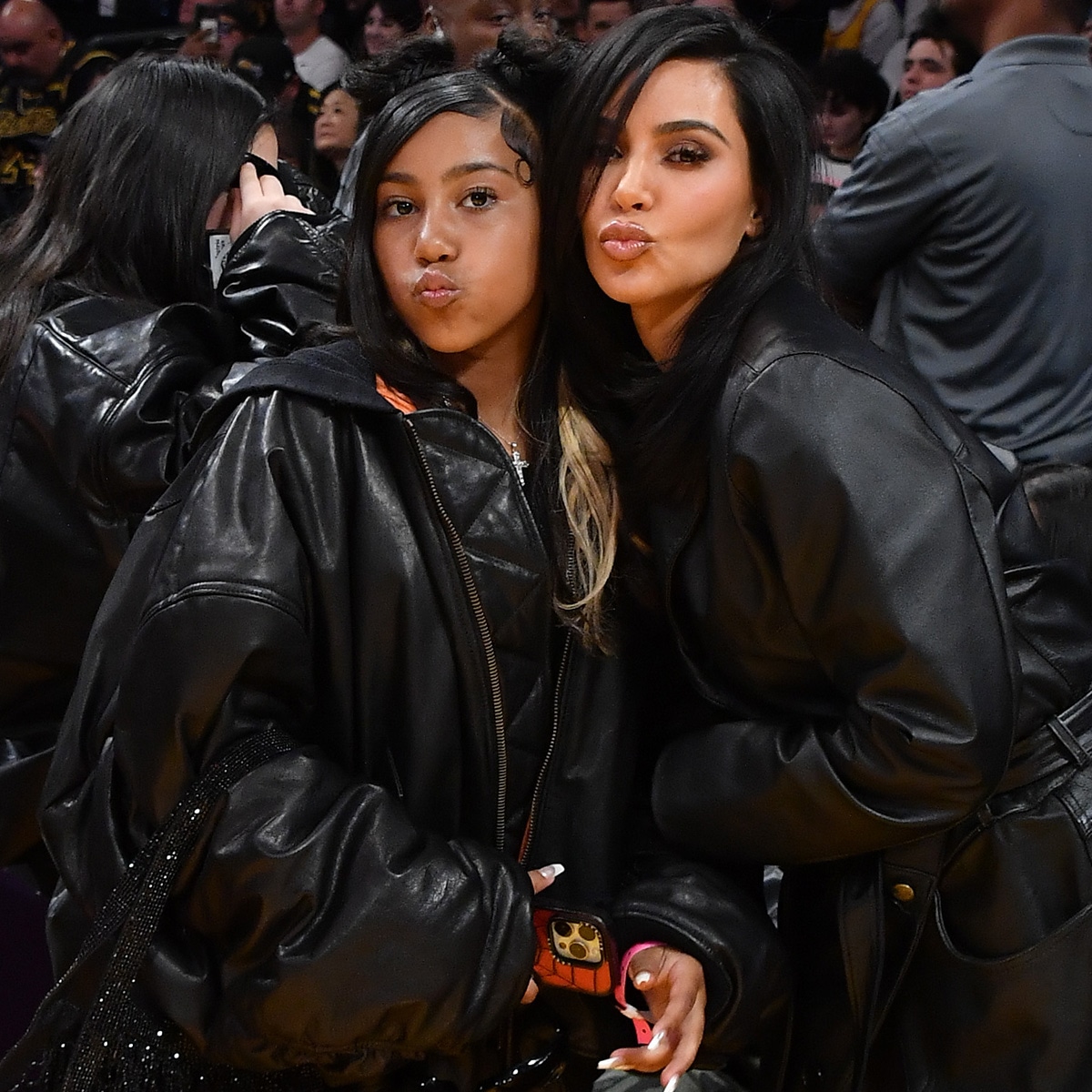 Kim Kardashian Says She Has to “Hold” North West Back